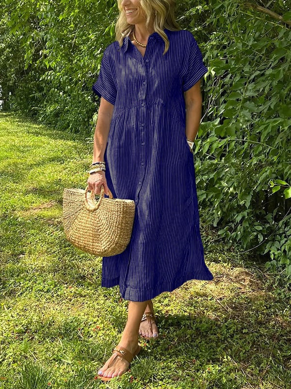 New button-up dress with striped flaps at the bottom | With functional pockets