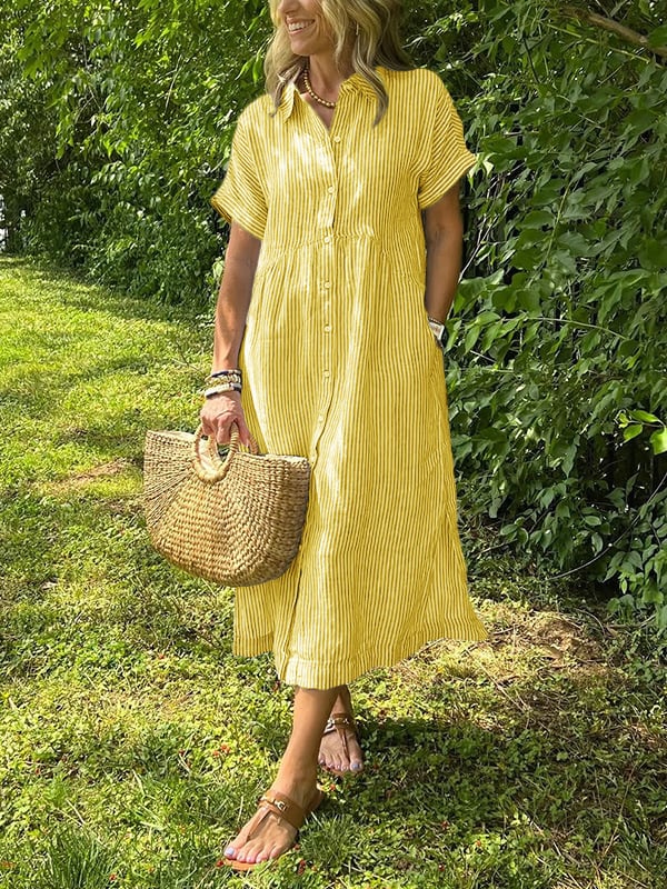 New button-up dress with striped flaps at the bottom | With functional pockets